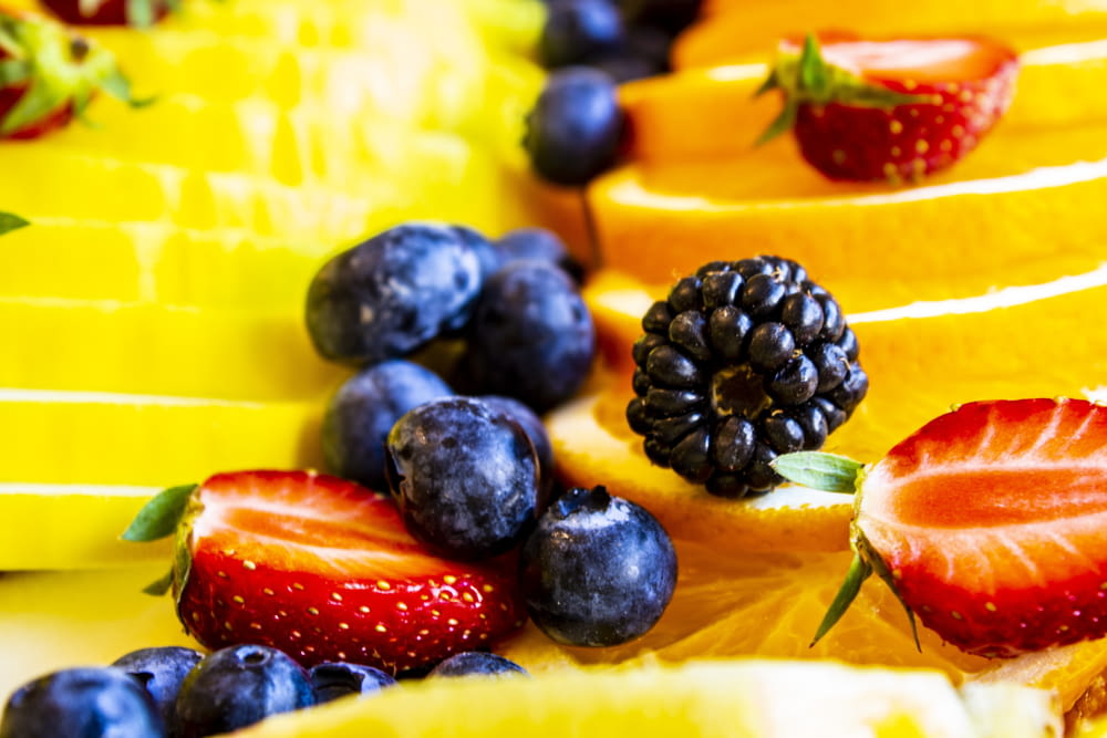 a close up of sliced fruit on a table