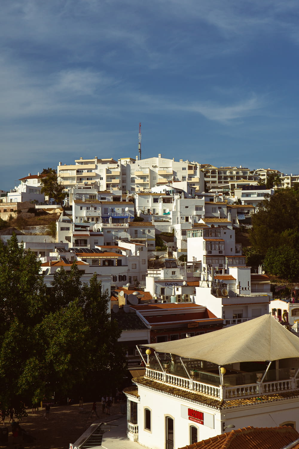 a view of a city with white buildings