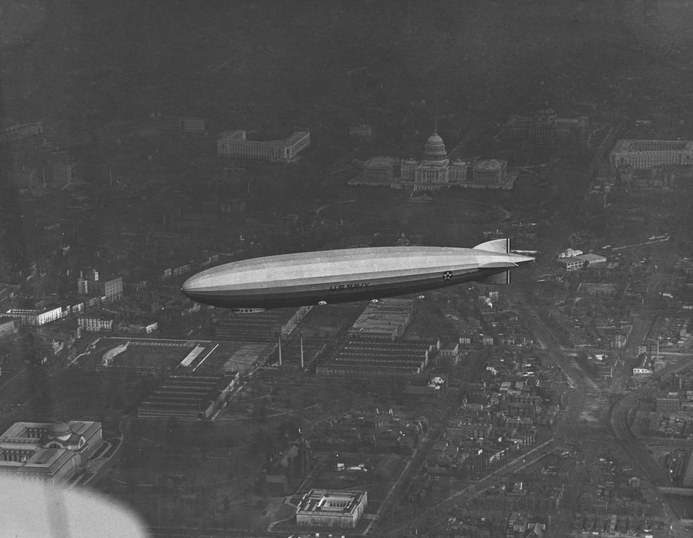 USS Los Angeles in flight over Washington, D.C., with the U.S. Capitol in the background.