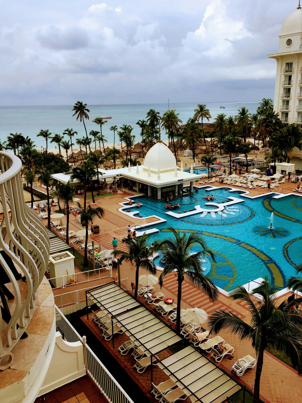 a view of a resort pool from a balcony