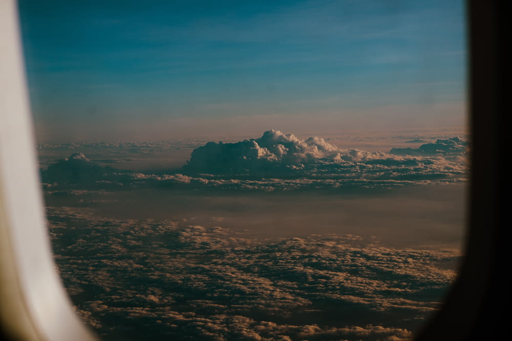 a view of clouds from an airplane window