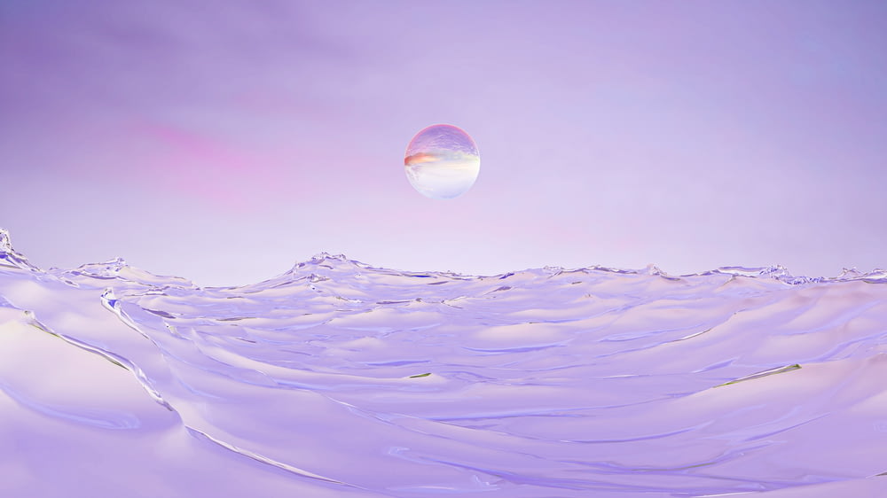 an abstract photo of a mountain with a bubble in the sky