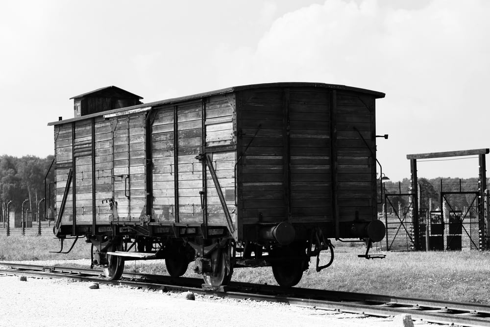 a black and white photo of a train car