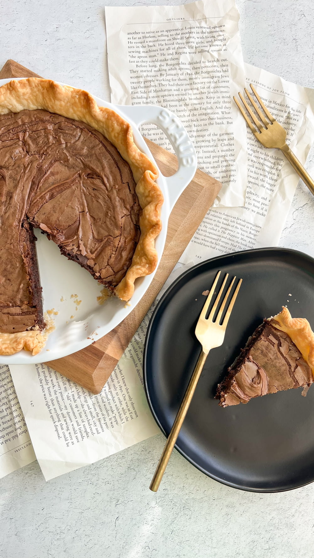 a slice of chocolate pie on a plate with a fork
