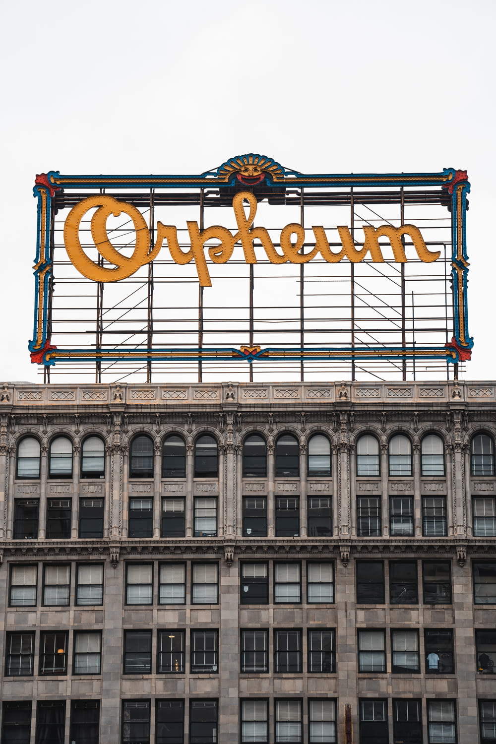 a large sign on top of a tall building