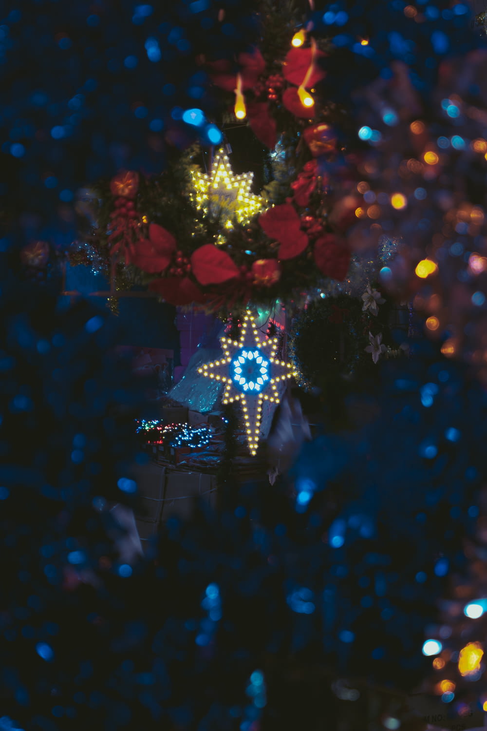 a christmas tree decorated with lights and a star