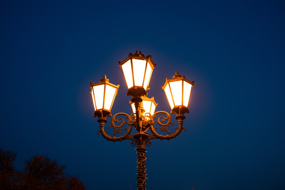 a street light with three lights on it