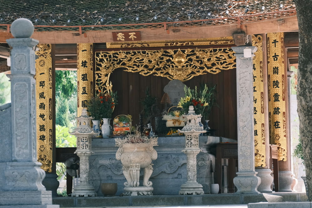 a shrine with a statue of a lion on it