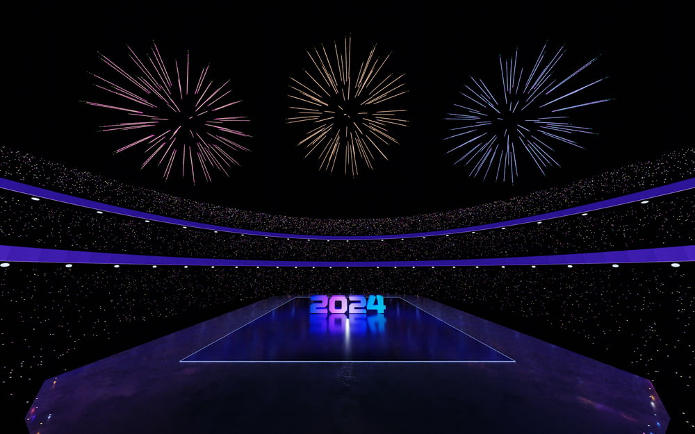 a tennis court is lit up with fireworks