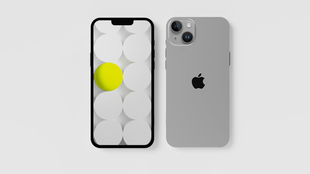 an iphone case with a yellow ball on it