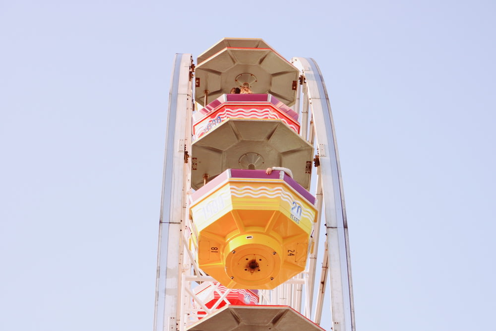 a ferris wheel with a sky in the background