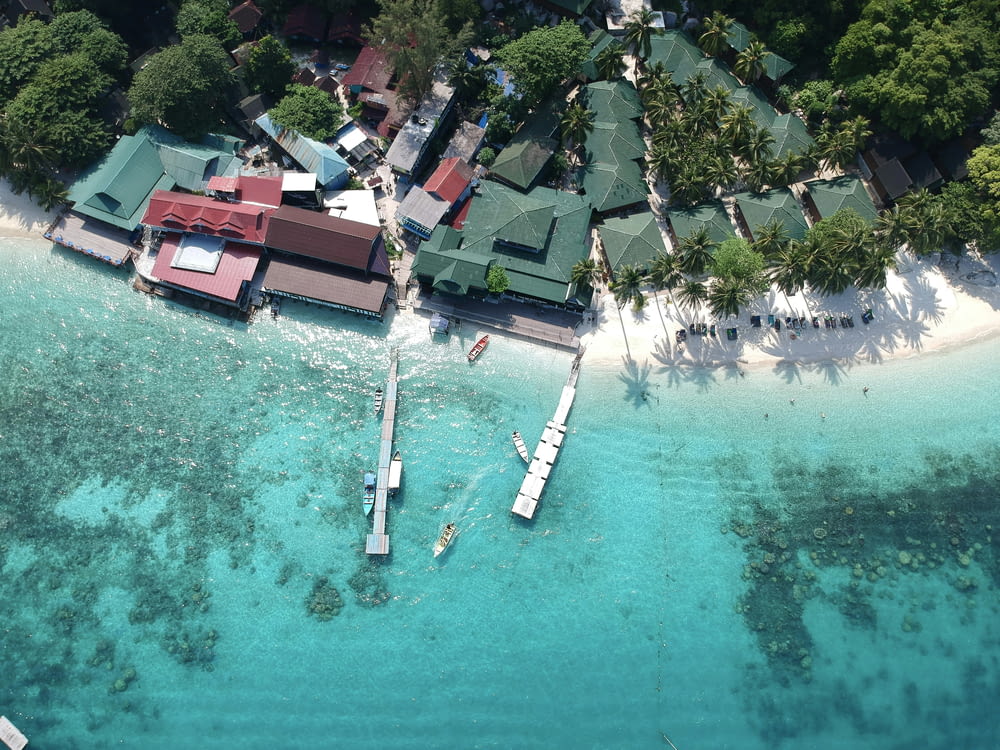 an aerial view of a resort on a tropical island