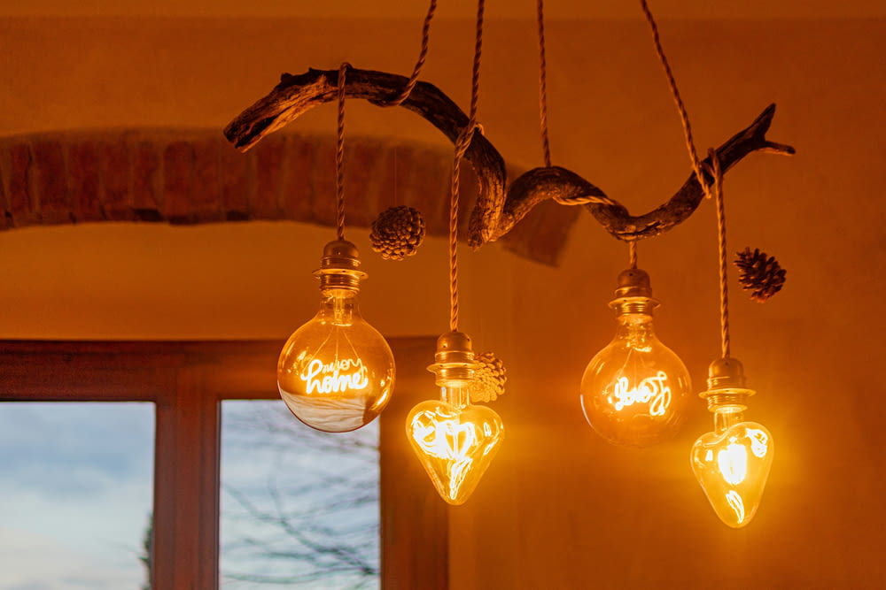a group of light bulbs hanging from a ceiling