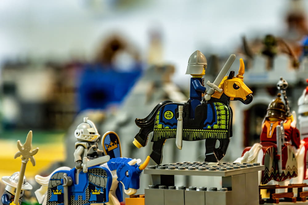 a group of toy figurines of knights and knights