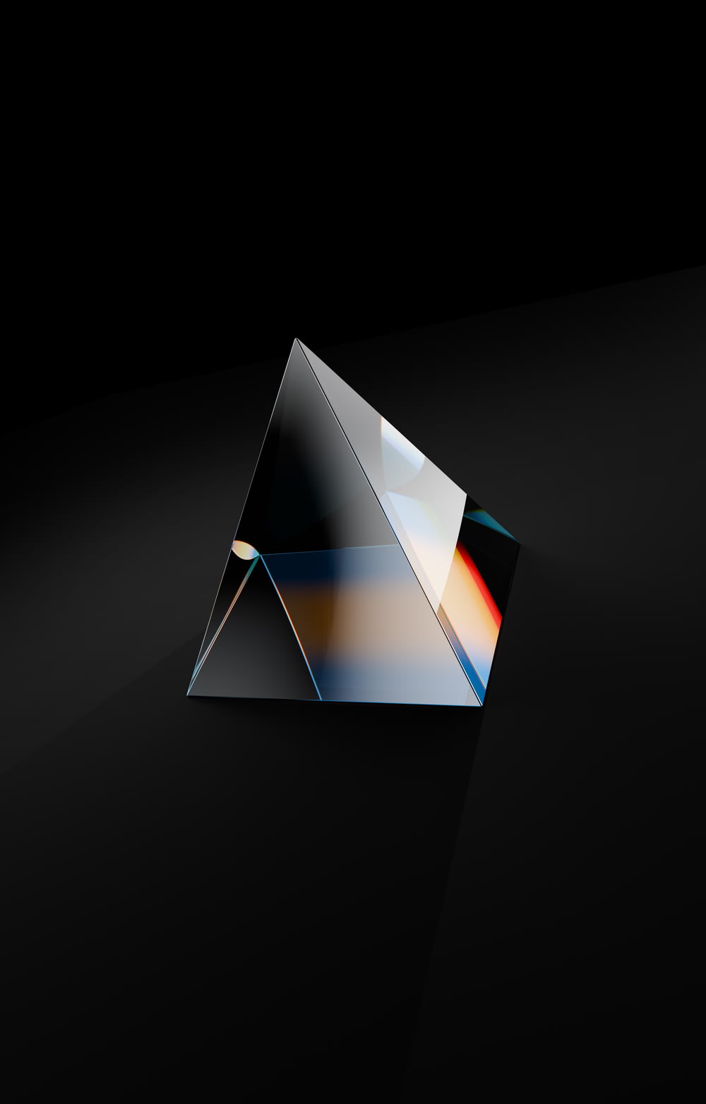 a black background with a triangle shaped object