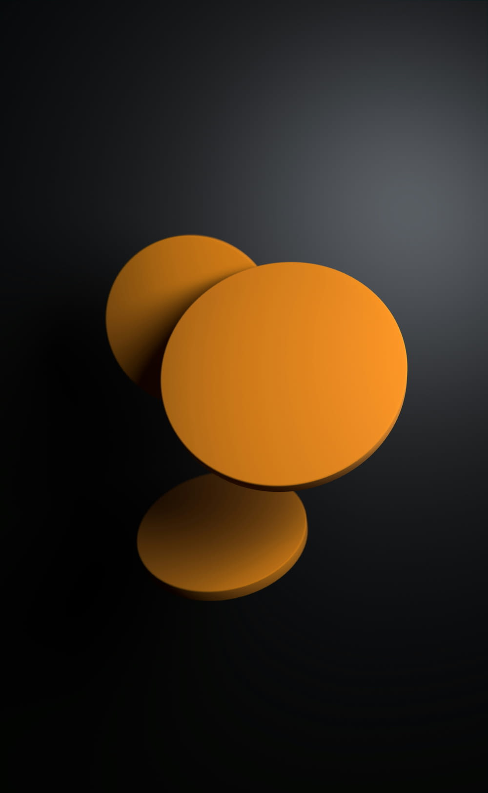 three orange circles on a black background