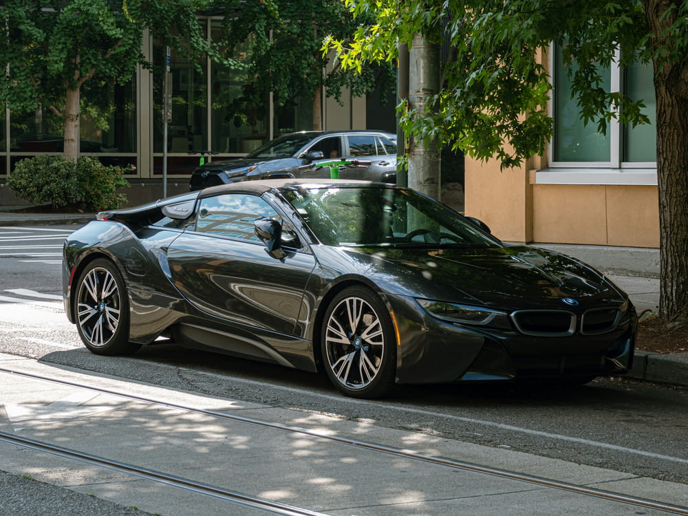 a bmw sports car parked on the side of the road