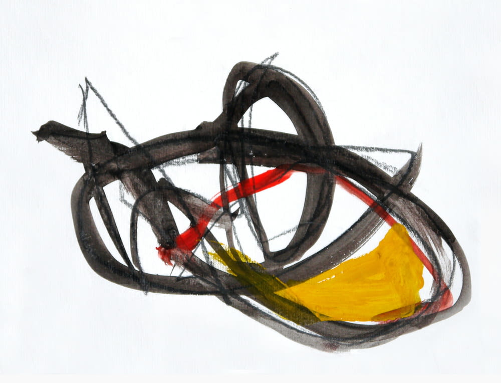 a drawing of a yellow and black object