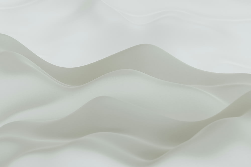 a close up view of a wavy white surface