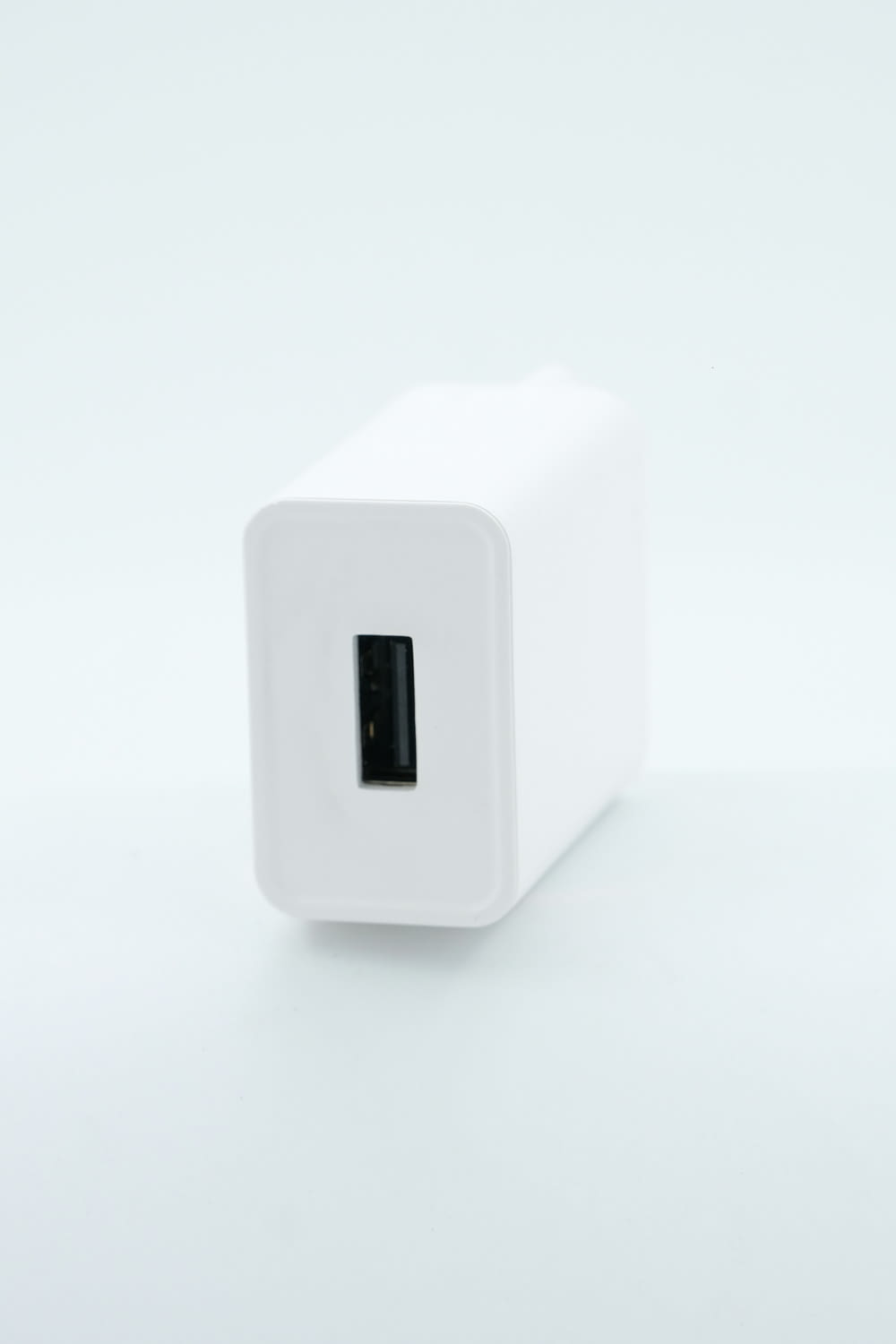 a white square object on a white surface