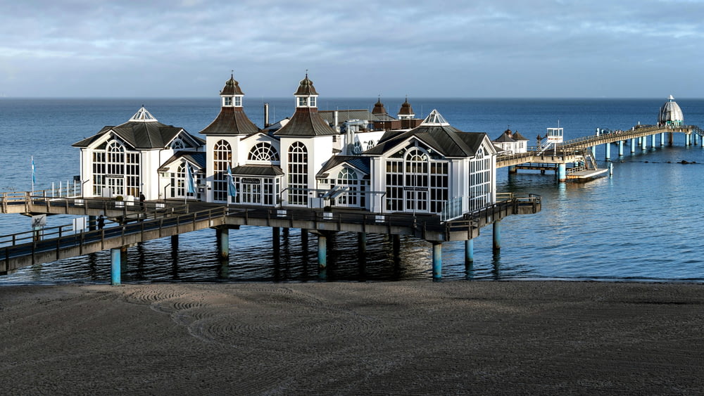 a pier with a house built into the water