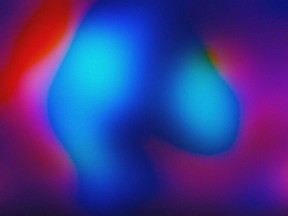a blurry image of a blue and red object