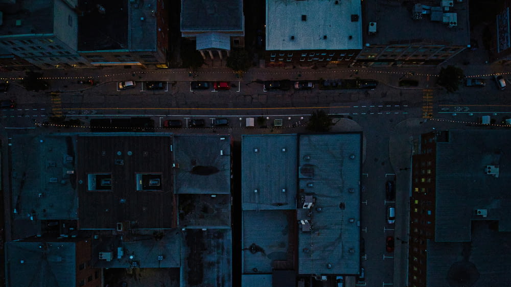an aerial view of a city street at night
