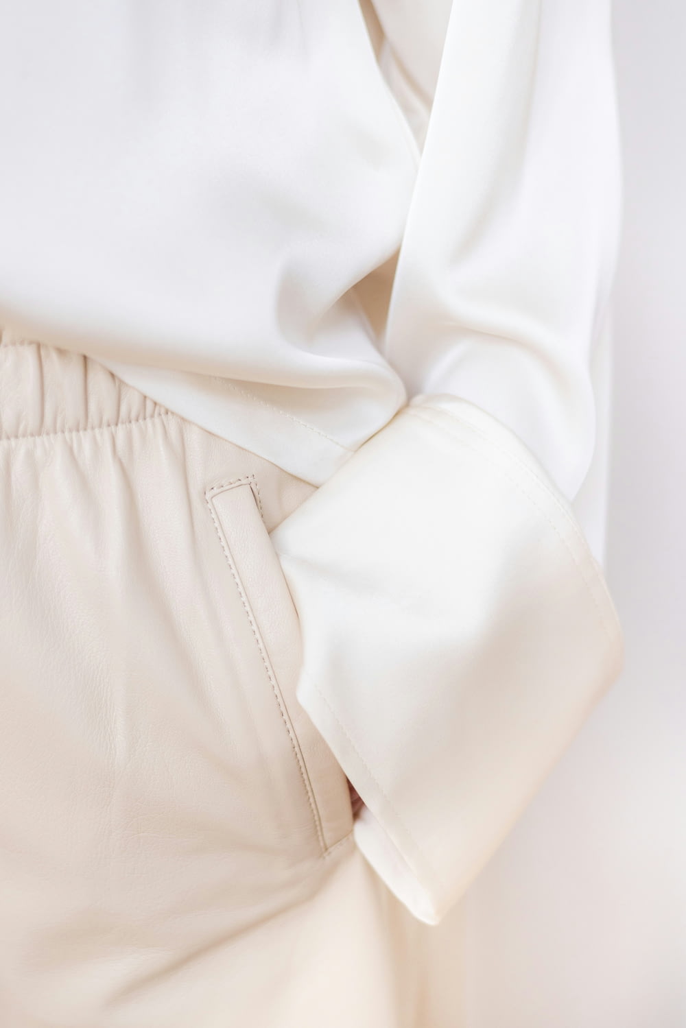 a close up of a white shirt and pants