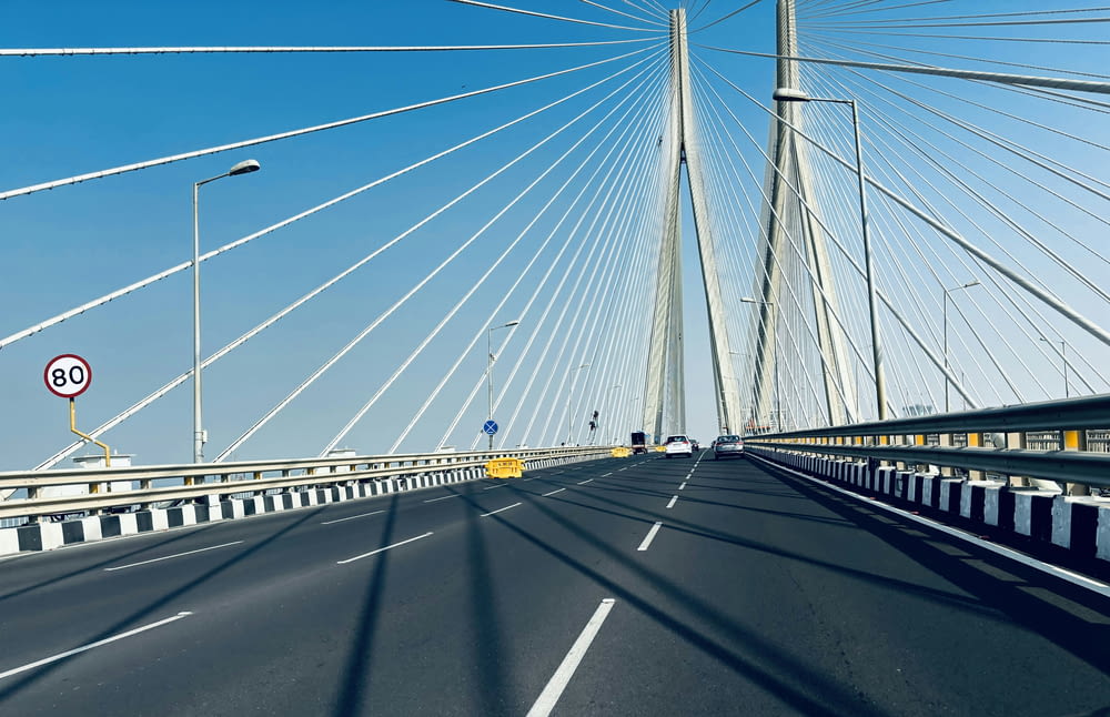 a view of a bridge from the inside of the car