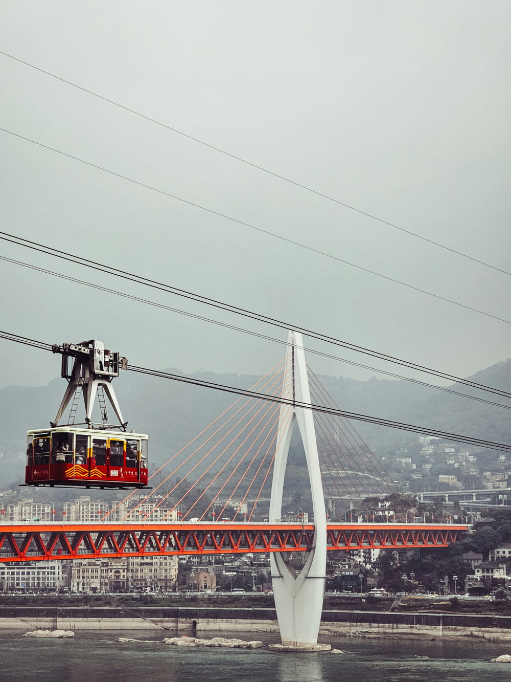 a cable car is going over a bridge