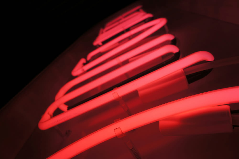 a row of neon lights sitting on top of a table