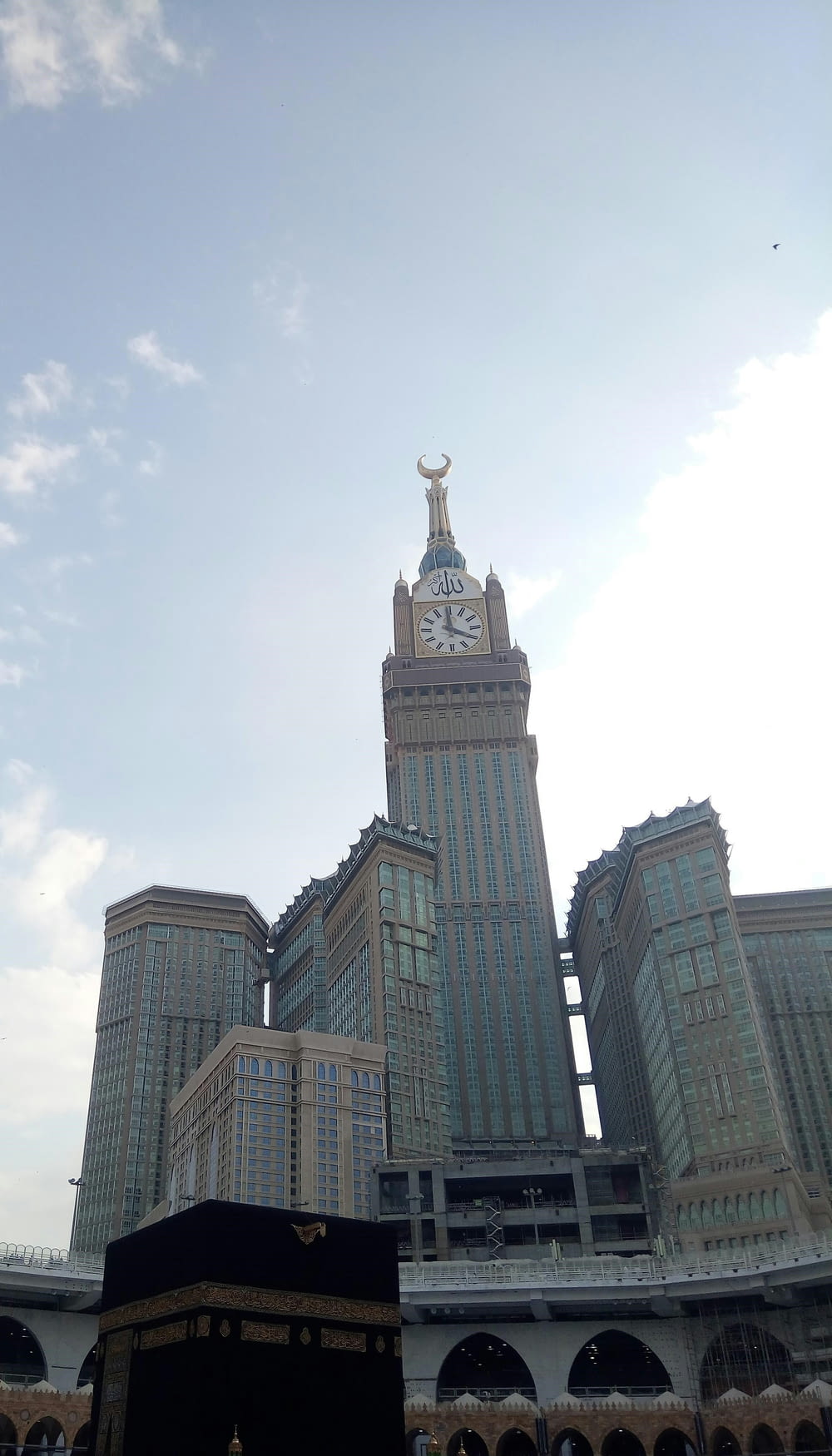 a tall building with a clock on the top of it