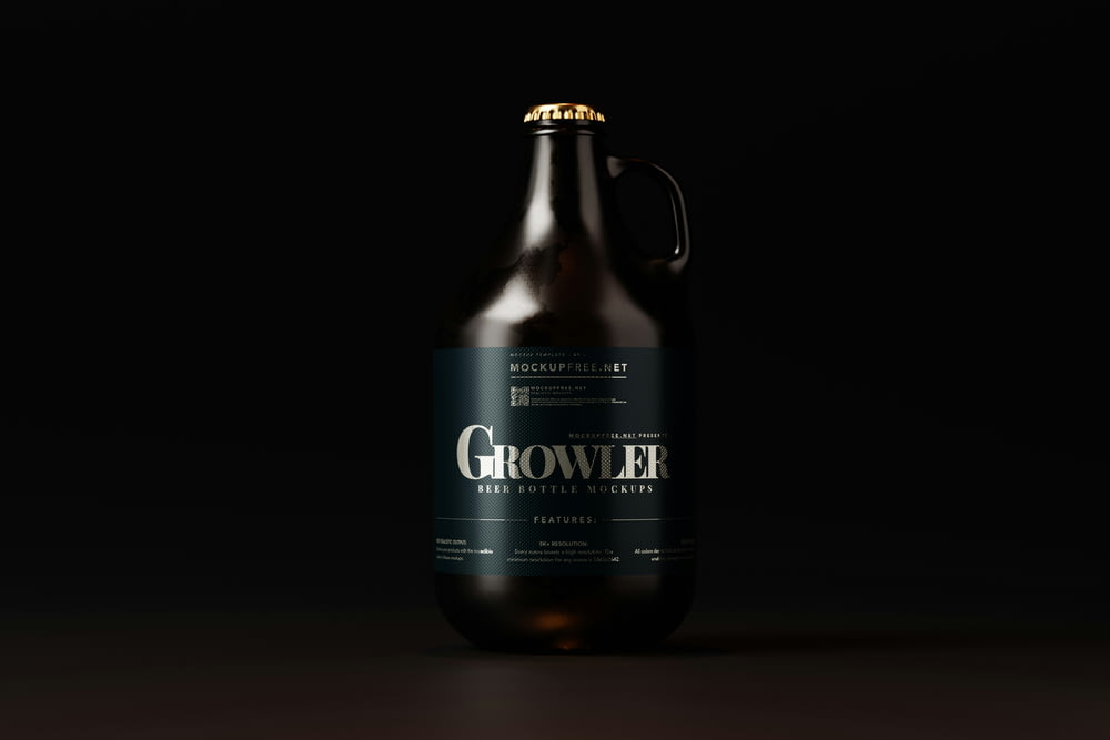 a bottle of growl beer on a dark background