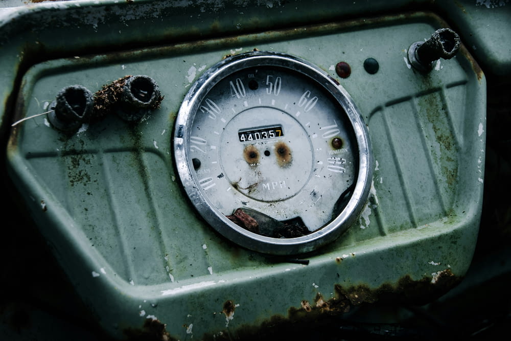 a close up of a meter on a vehicle