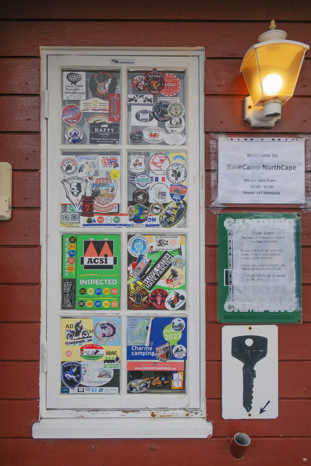 a door with a bunch of stickers on it