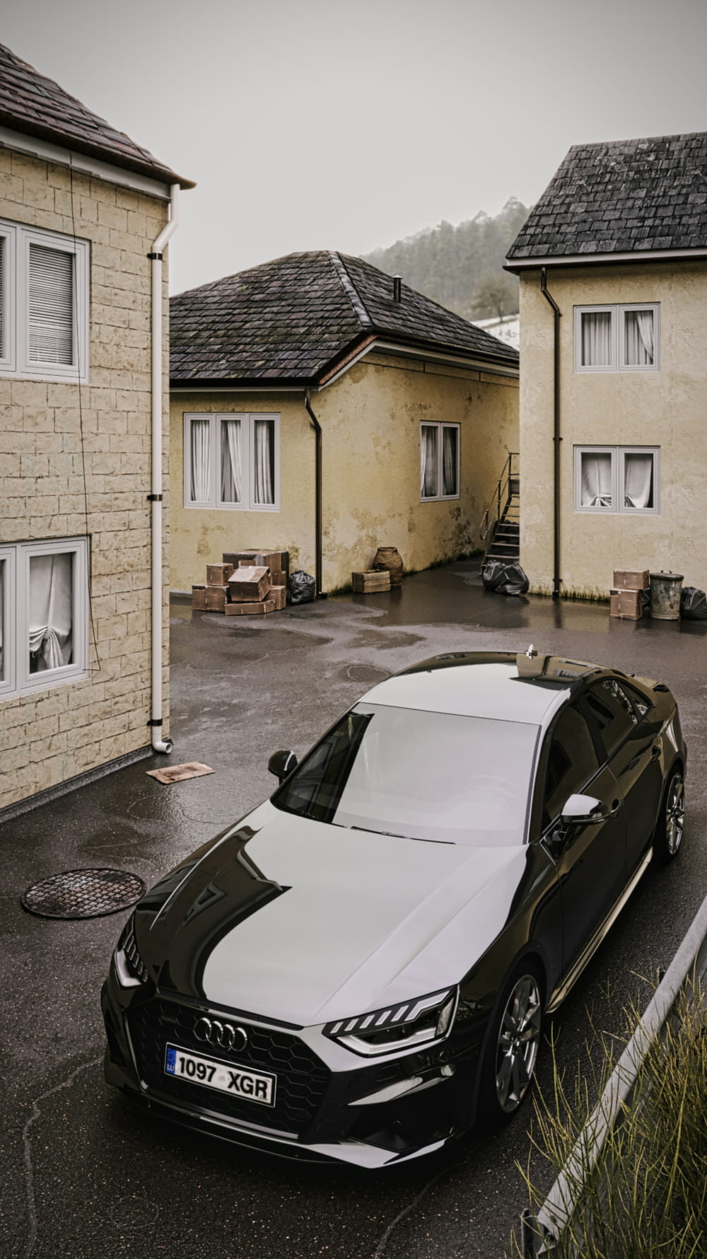 a black and white car parked in front of a house