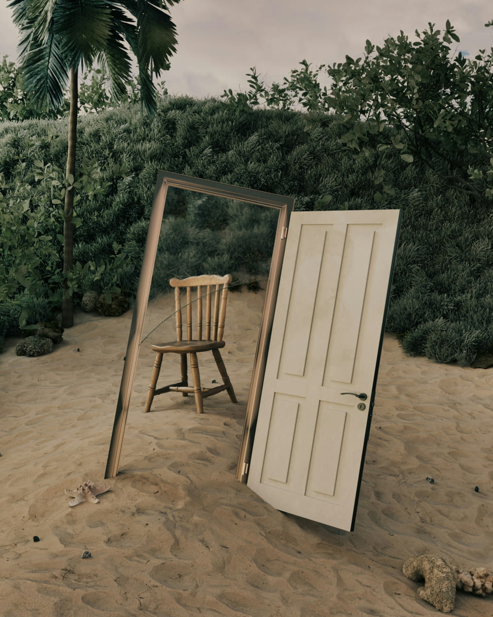 a wooden chair sitting in the sand next to a mirror