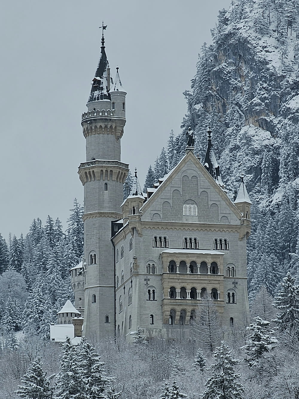 a large castle with a clock on the top of it
