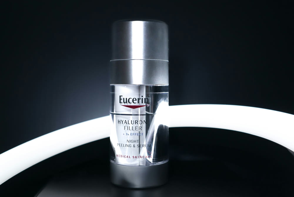 a bottle of eucerin eye cream sitting on a table