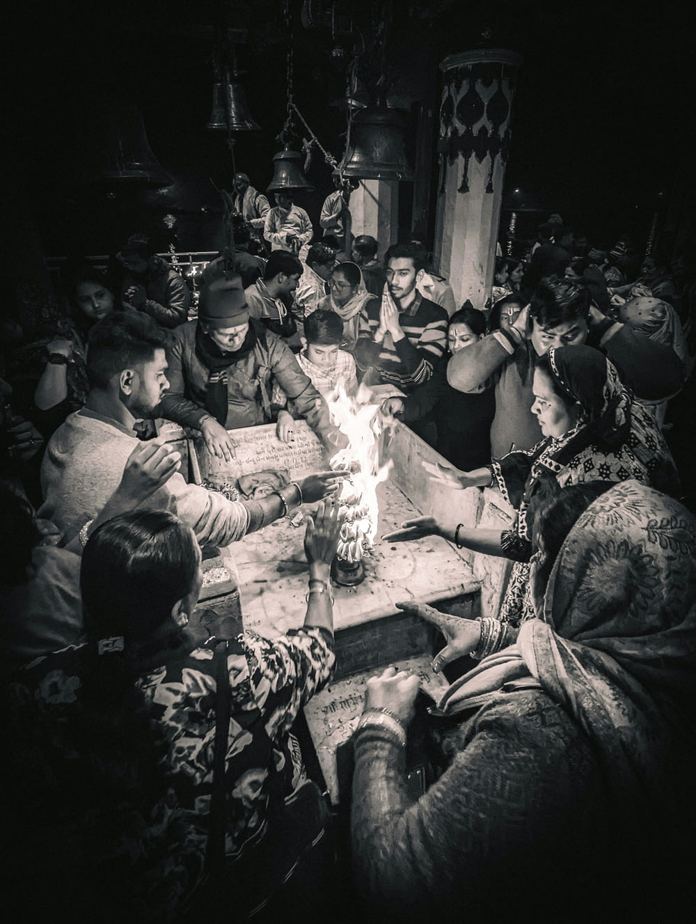 a group of people sitting around a table