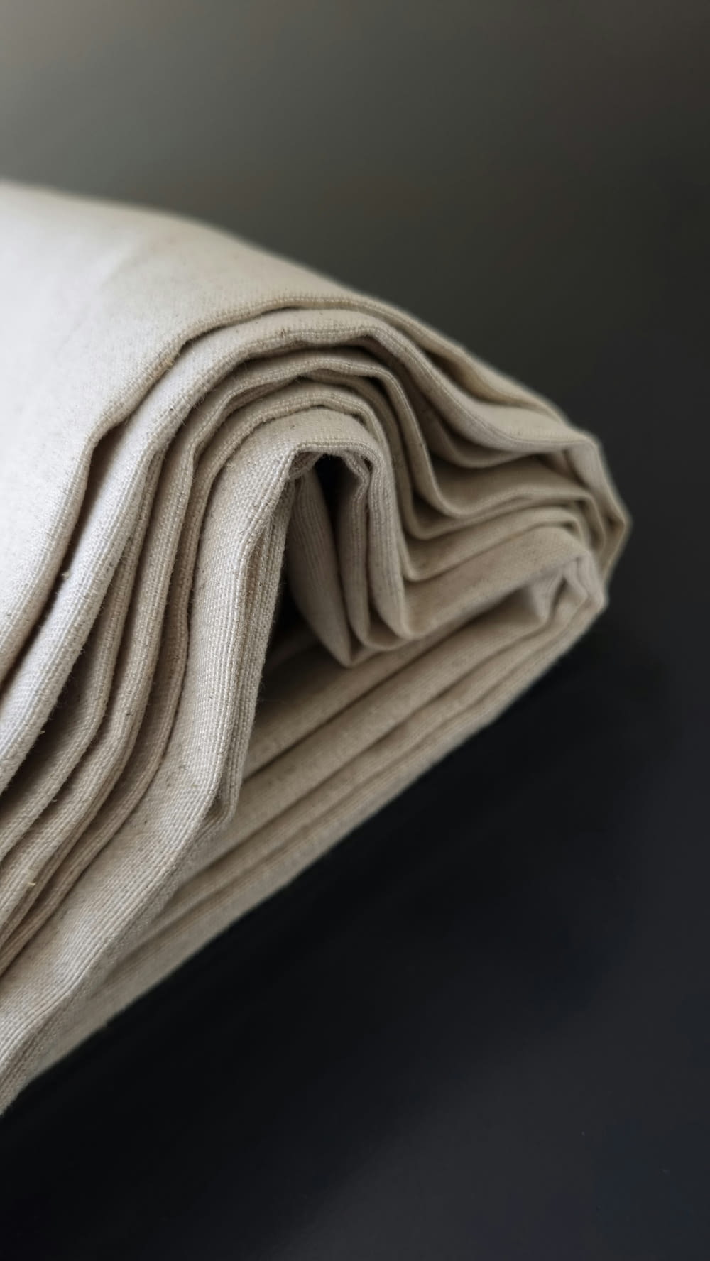 a close up of a folded cloth on a table