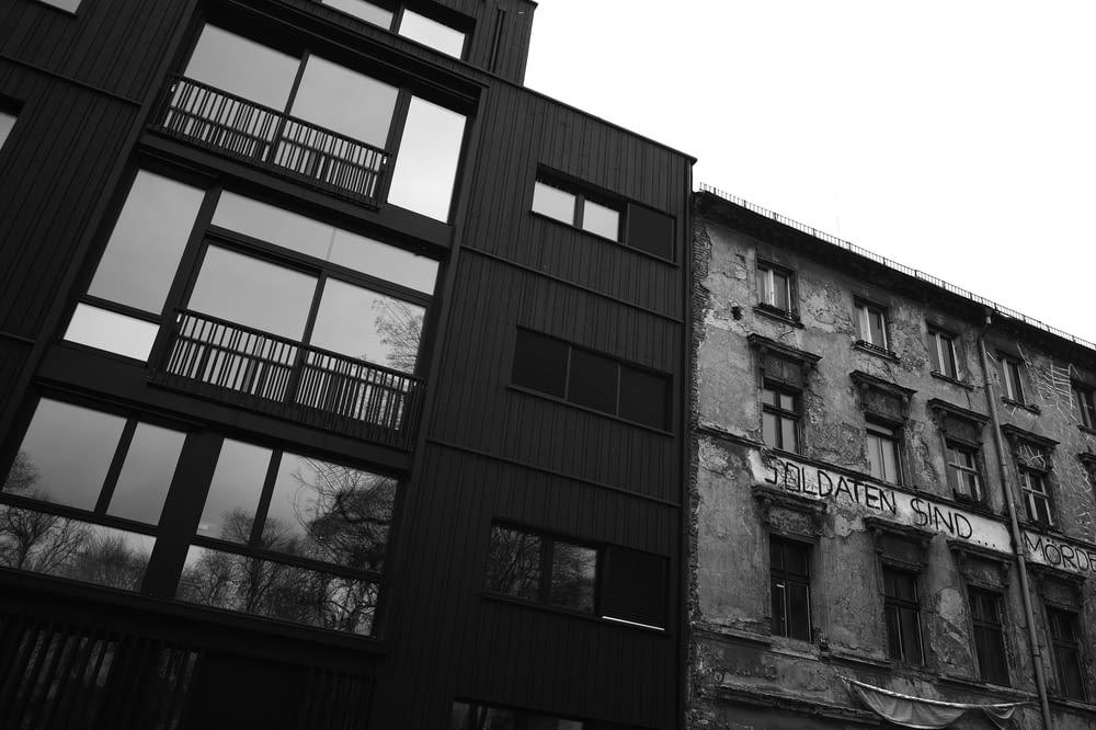 a black and white photo of a building with windows