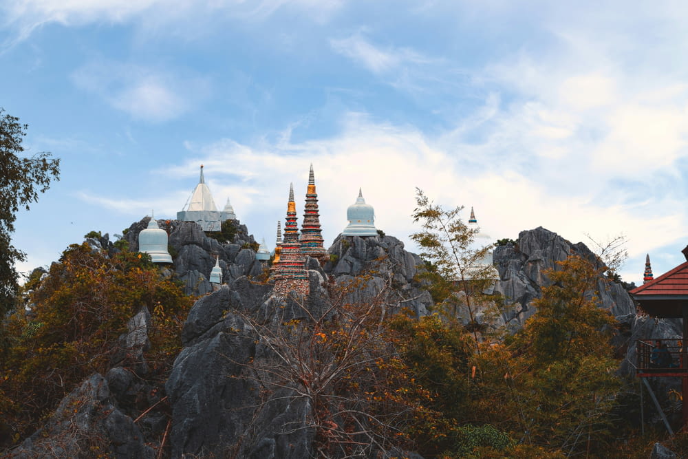 a view of a mountain with a temple on top of it