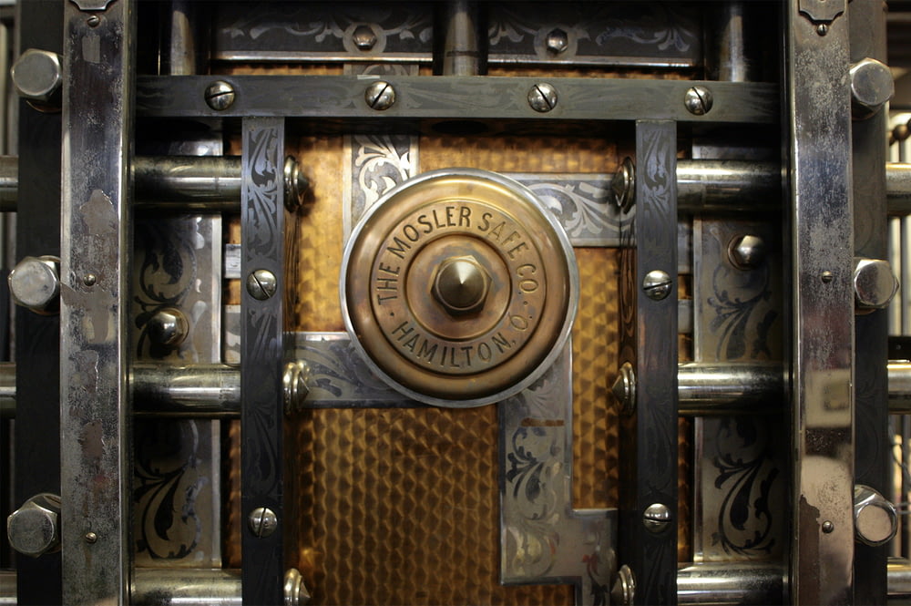 a close up of a metal door with a lock