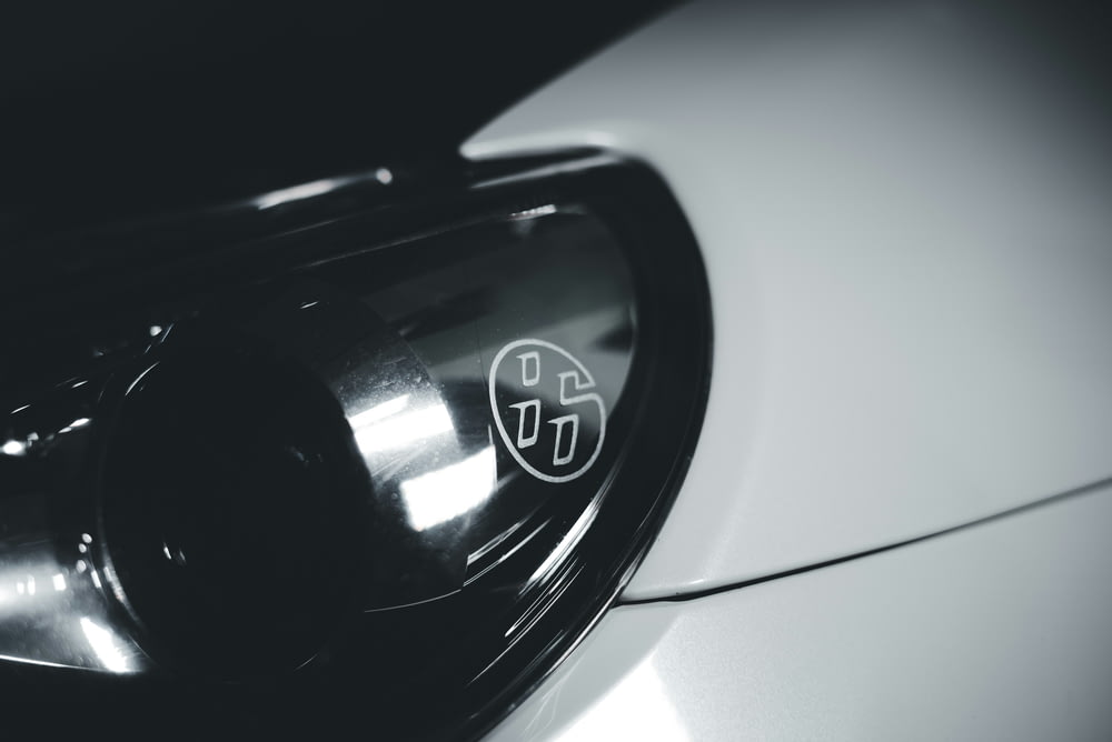 a close up of the emblem on a sports car