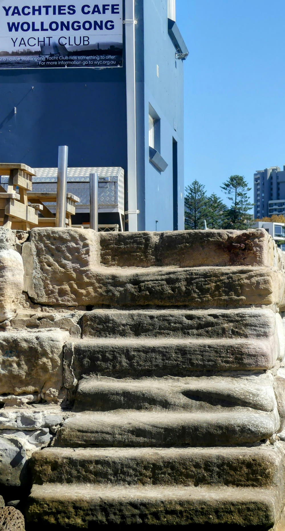 a bunch of stone steps outside of a building