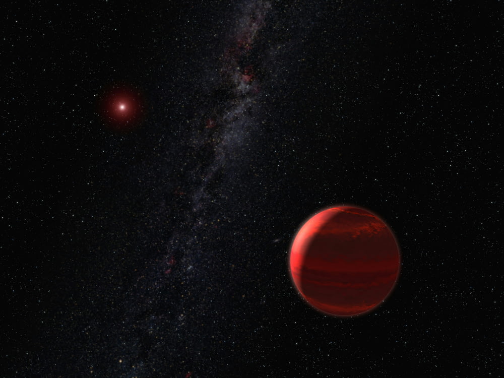 an artist's rendering of a red dwarf and a red dwarf star