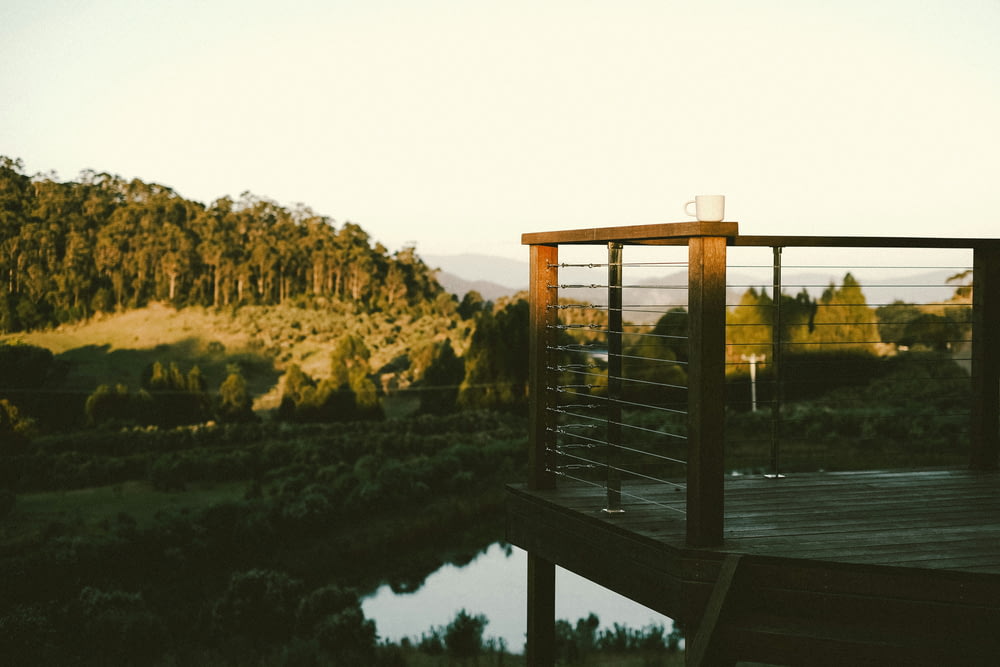 a wooden bridge over a small body of water