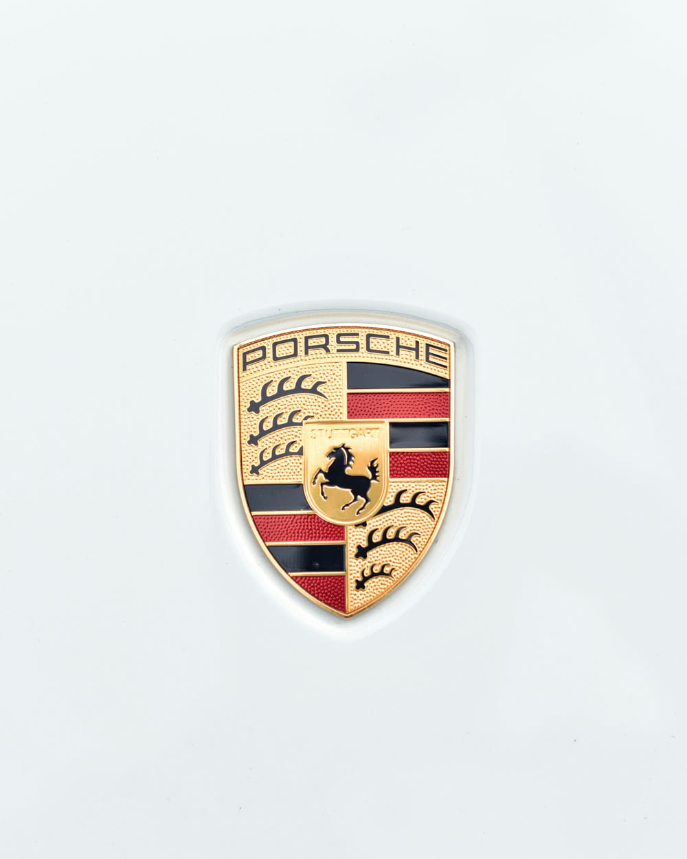 a porsche emblem on a white background