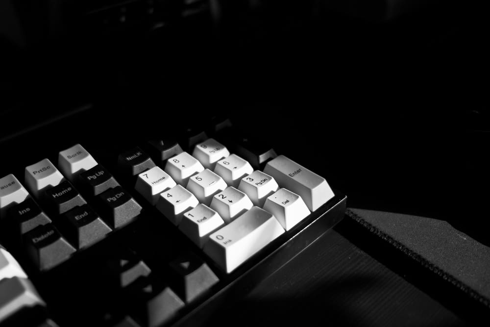 a black and white photo of a computer keyboard